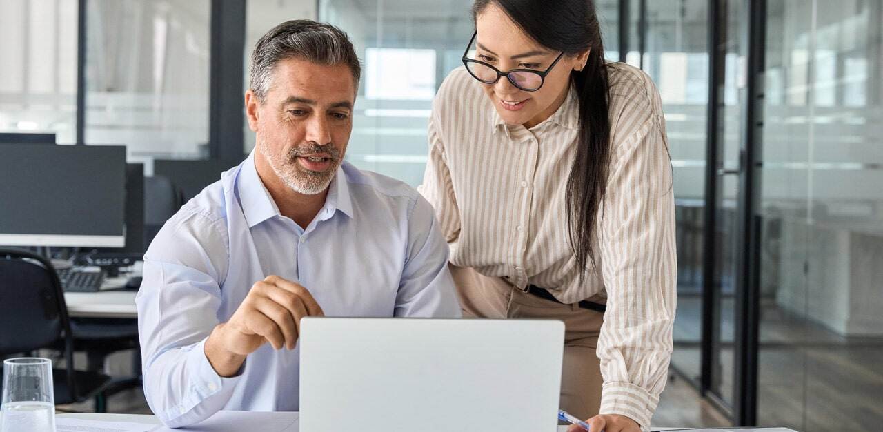 man-and-woman-looking-at-computer-min.jpg